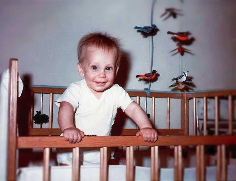 In my crib at Tyrone Terrace Apartments (#12-B), around 8 months old - 1966.