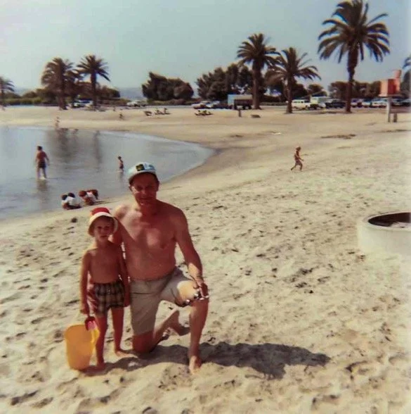 Dad and me on Mission Bay Beach, right beside the Bahia Motor Hotel in San Diego, CA. We vacationed there and visited friends in town almost every year - 1968.