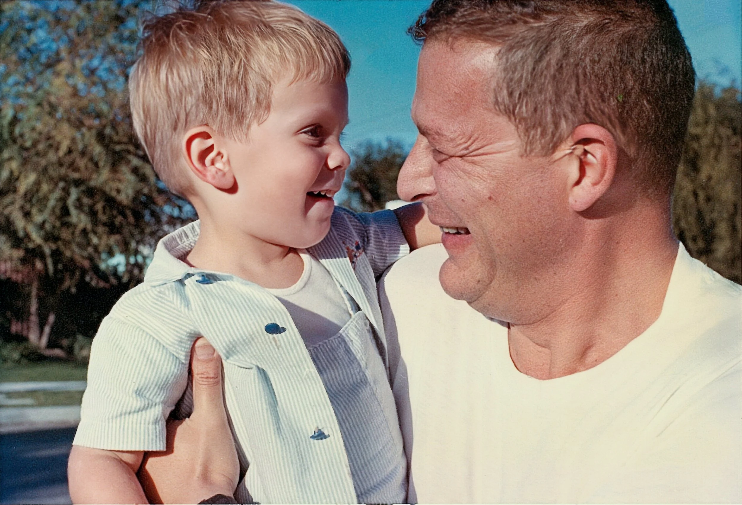 My favorite photo of my Dad and me, taken in the driveway of our Huston Street house - 1969
