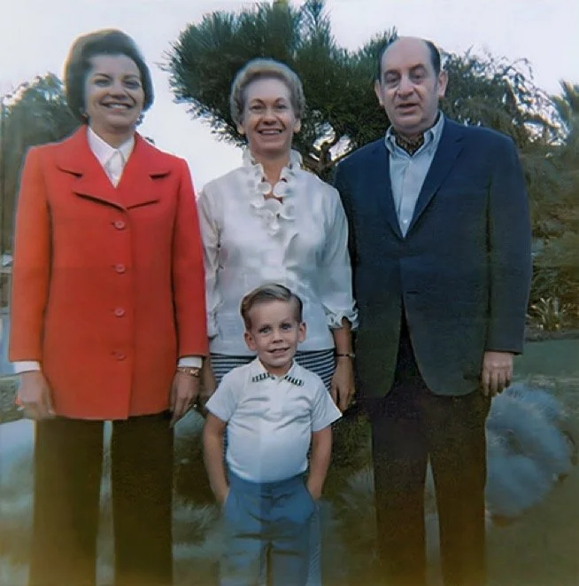 My Great Aunt Evelyn, my Mom, my Great Uncle Rob, and me in front of the Japanese Pine tree in our front yard. Uncle Rob had a pacemaker the size and shape of a deck of cards he would show off, implanted beneath the skin of his chest; freaky stuff for a kid! - 1969