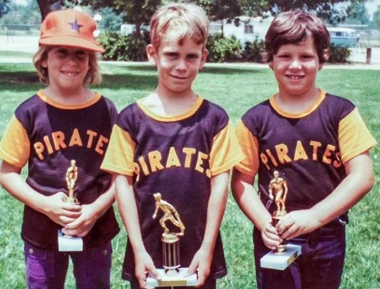 Posing proudly with two teammates and our trophies from the Encino Little League "Pirates" baseball club. (Tragically, during my mother's brutal robbery and murder in our Huston Street home nine years later, this very trophy would be used as a weapon to inflict multiple blunt force traumas.) - Summer 1973.