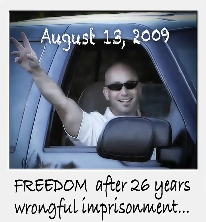 Bruce Lisker waving from a truck window as he leaves prison on August 13, 2009.