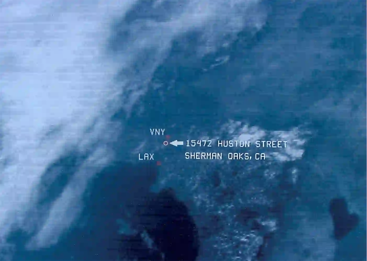 GOES-5 satellite image, 11:00 A.M. on March 23, 1983 — scattered cloud over the Pacific and U.S. West Coast; broken-to-clear skies over the San Fernando Valley. The conditions Detective Monsue and LAPD photographer Wilson chose for their staged reconstruction of Bruce's views through the rear windows.