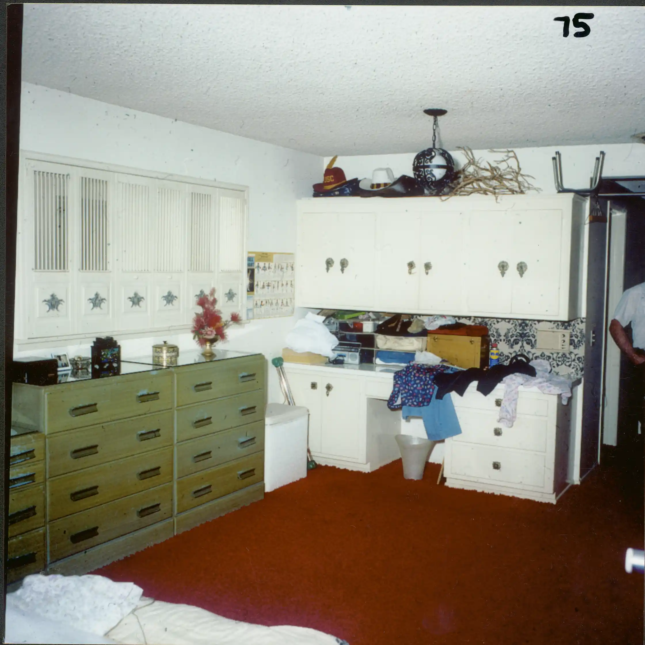 Police photo showing exercise bar and wall chart taped above it.