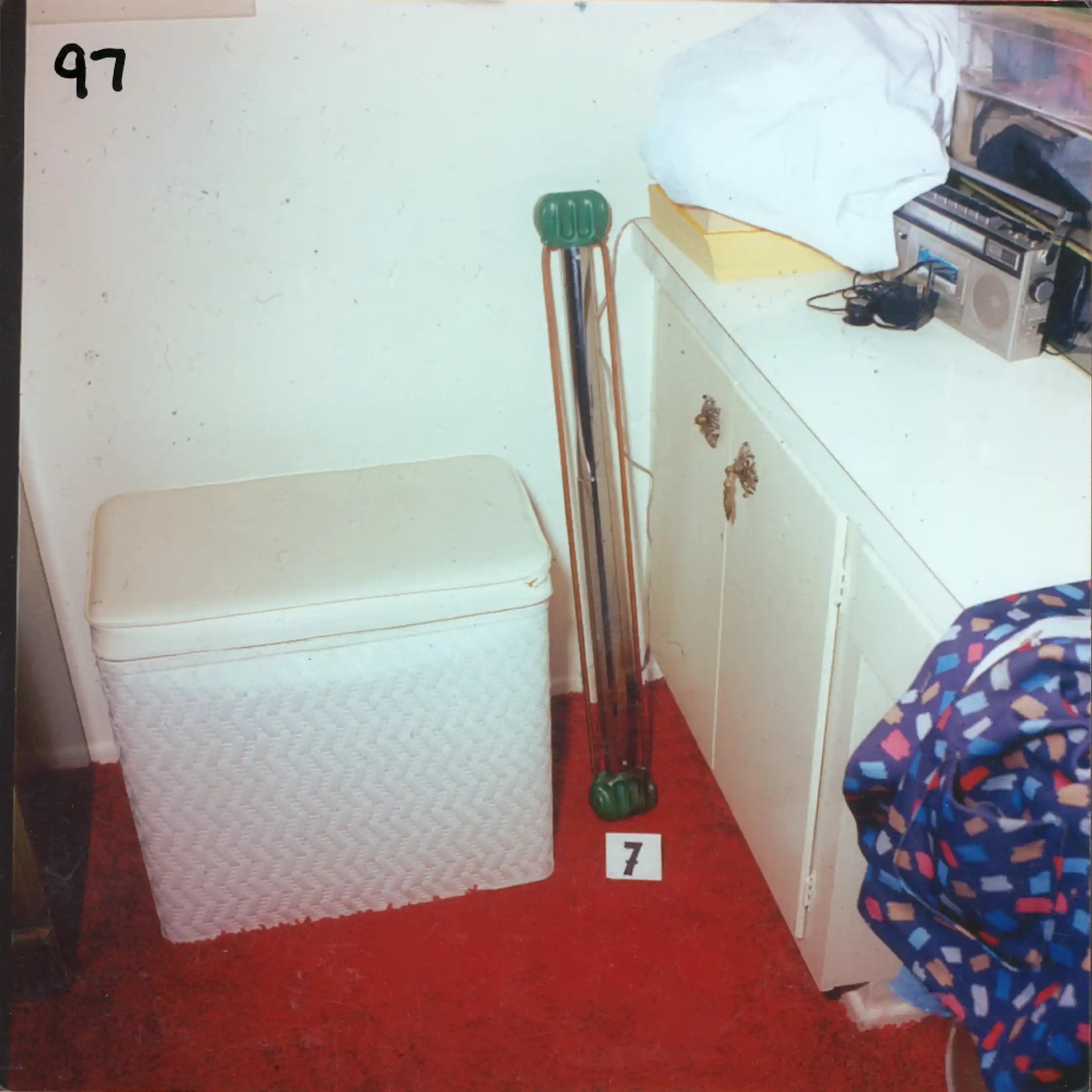 Closeup of the exercise bar, with bottom right edge of the wall chart above.